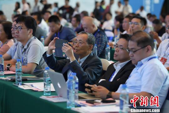 研討會現(xiàn)場圖?！■暮陚?攝